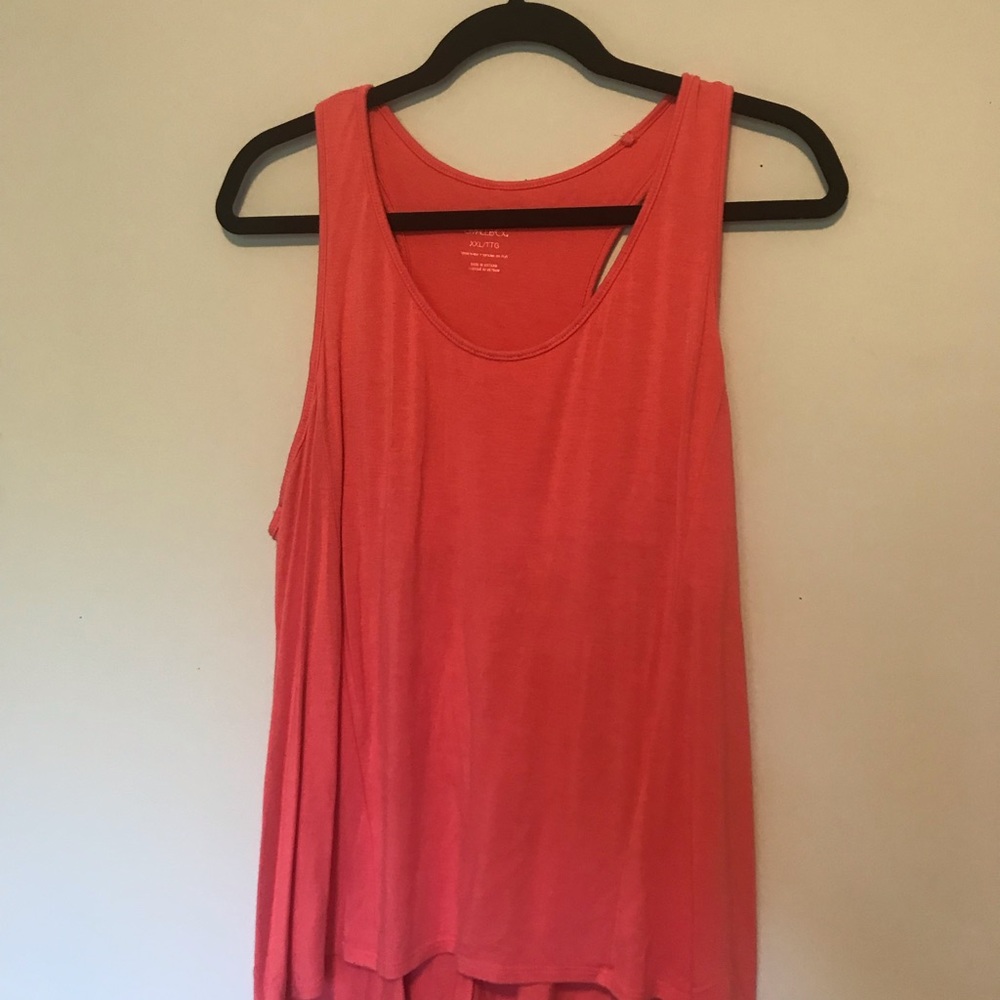 Coral colored work our top with shelf bra